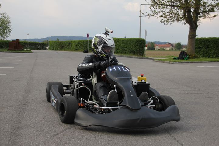 The finished electric race kart driving on a test track